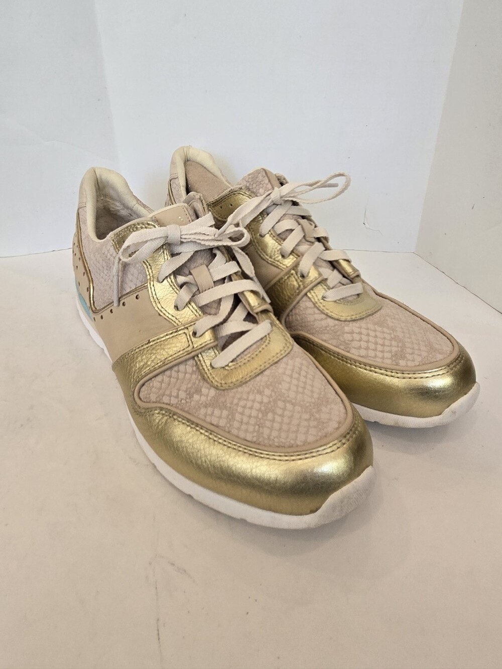UGG Women’s Gold and Cream Metallic Lace-Up Sneakers